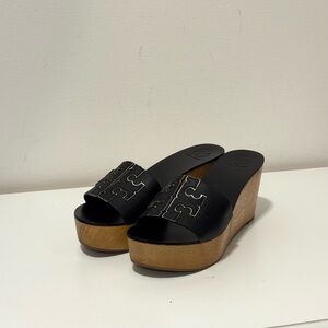 Tory Burch Ines wedge platform slide sandal in black leather.
